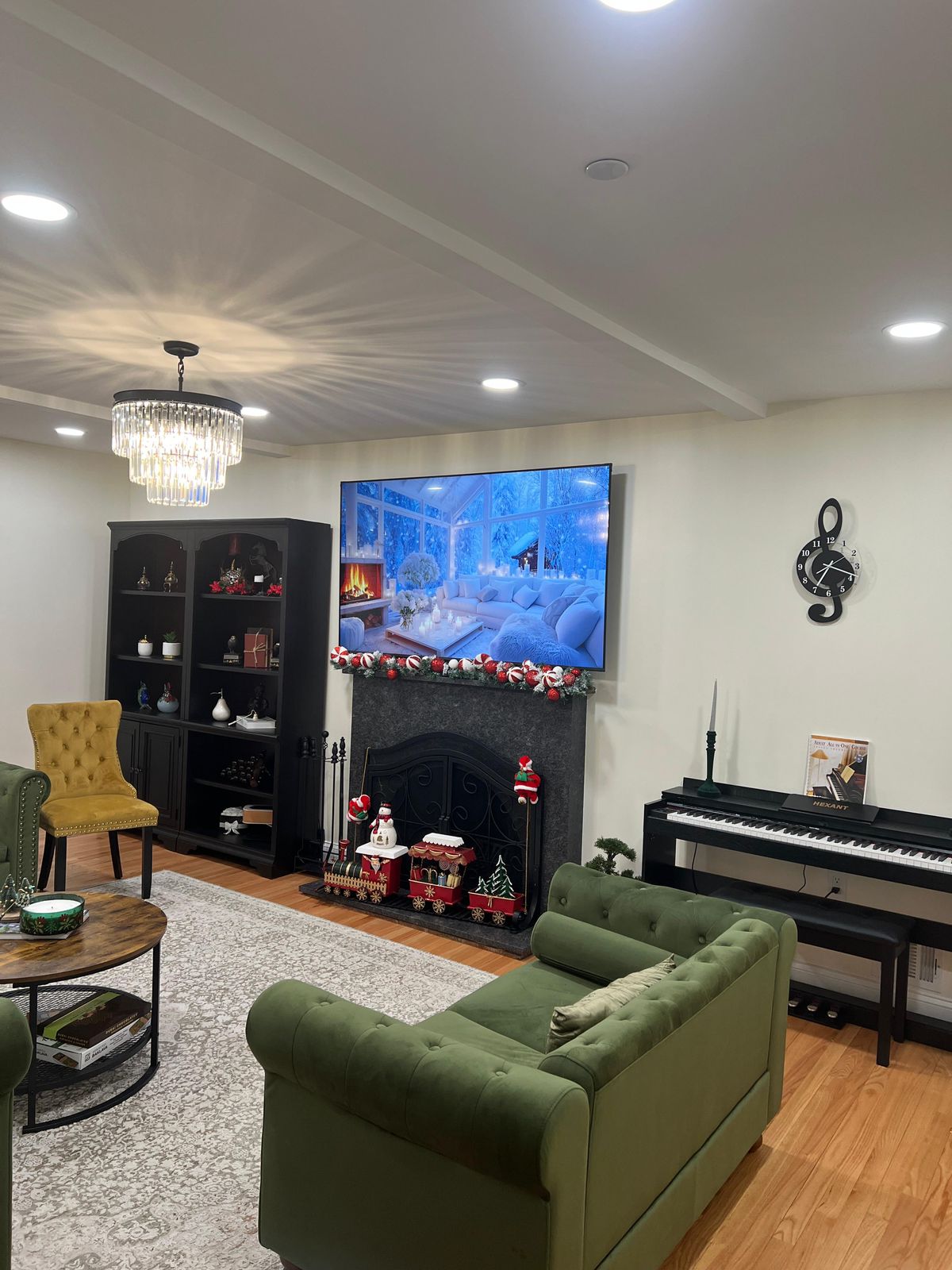 Cozy living room with fireplace, piano, and elegant furniture